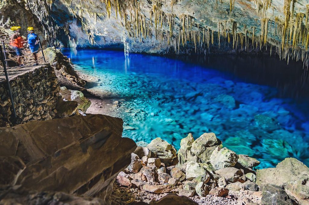 Beautiful underground river and cave with clear blue water in Bonito, Brazil.