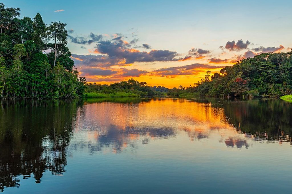 Sunset reflection in Amazon Rainforest, Colombia