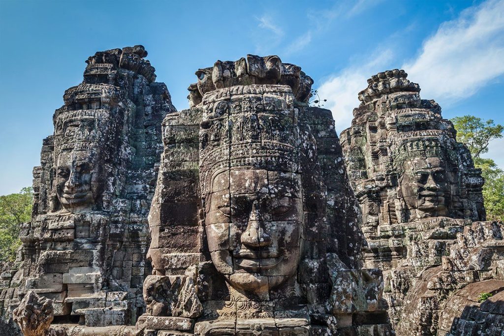 Ancient stone faces of Bayon temple in Angkor, Cambodia