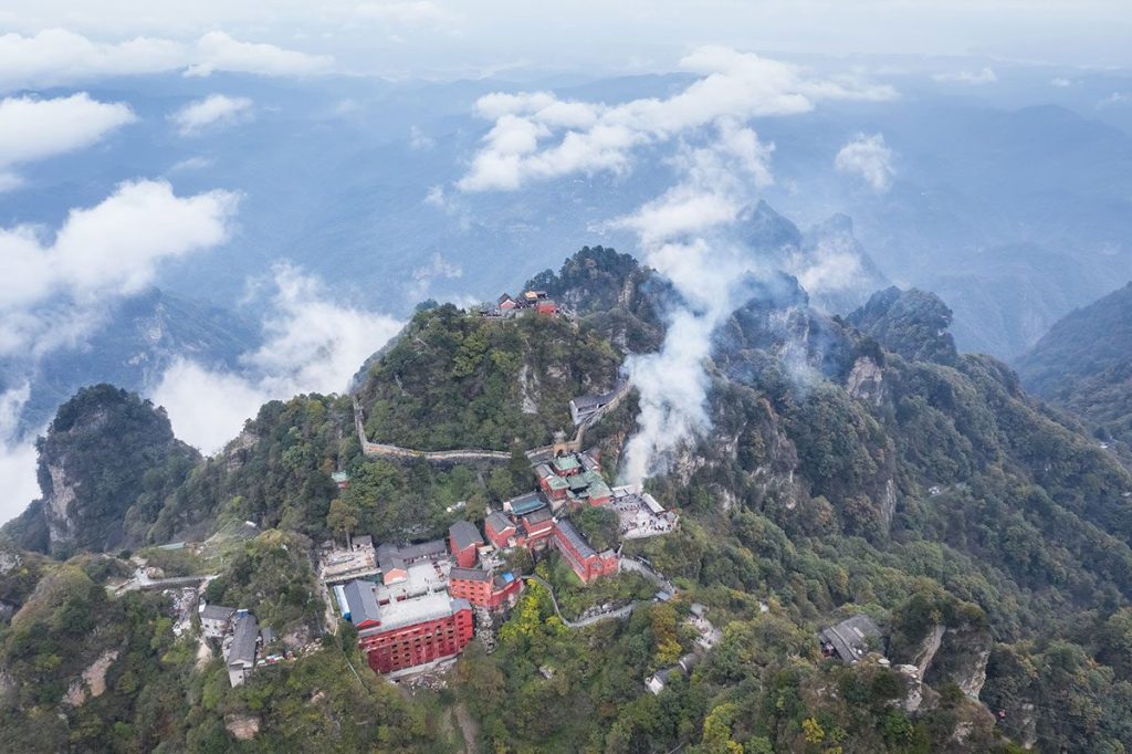 Aerial view of Wudang Mountain landscape with the golden palace on the highest peak, Taoist holy land, China