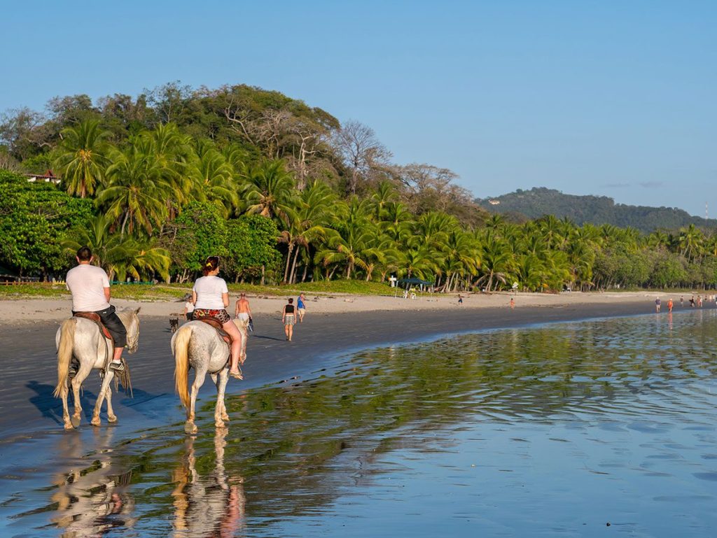 Horseback riding on the beach in Samara, Costa Rica.