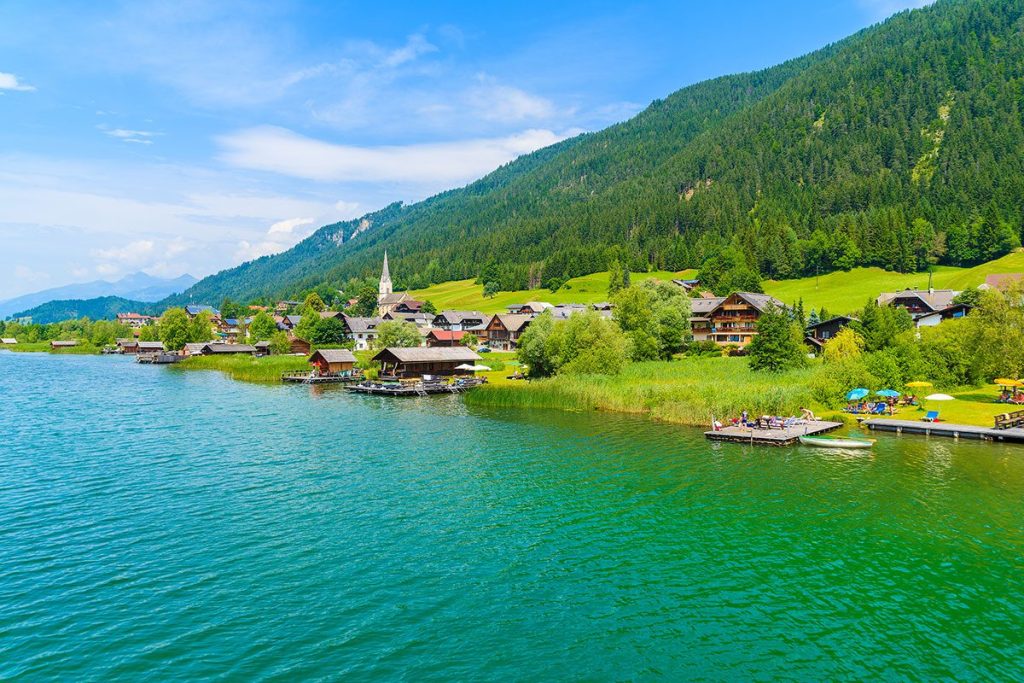 Beautiful view of Weissensee alpine lake with green water