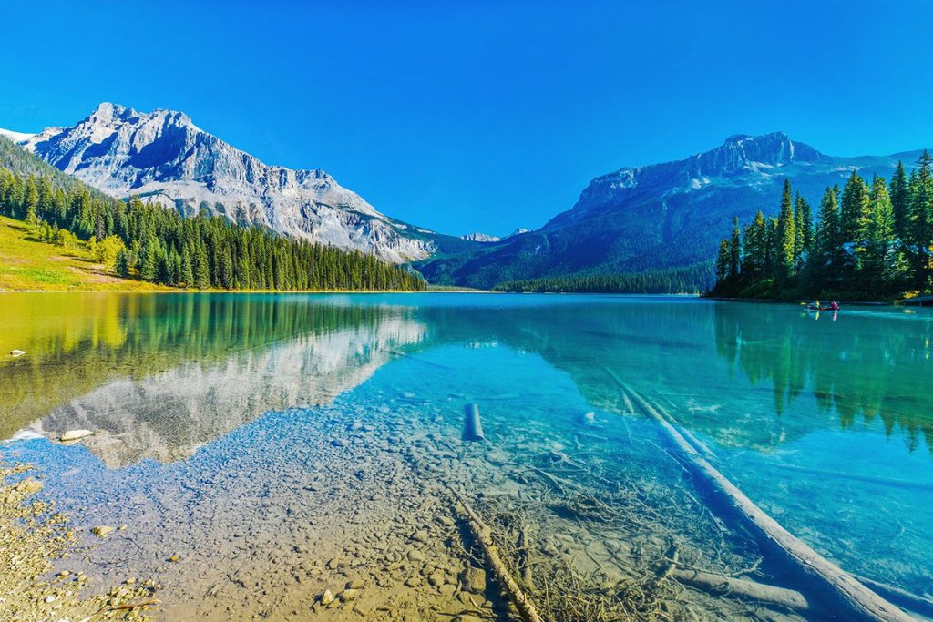 Emerald Lake surrounded by mountains in Yoho National Park, Canada.