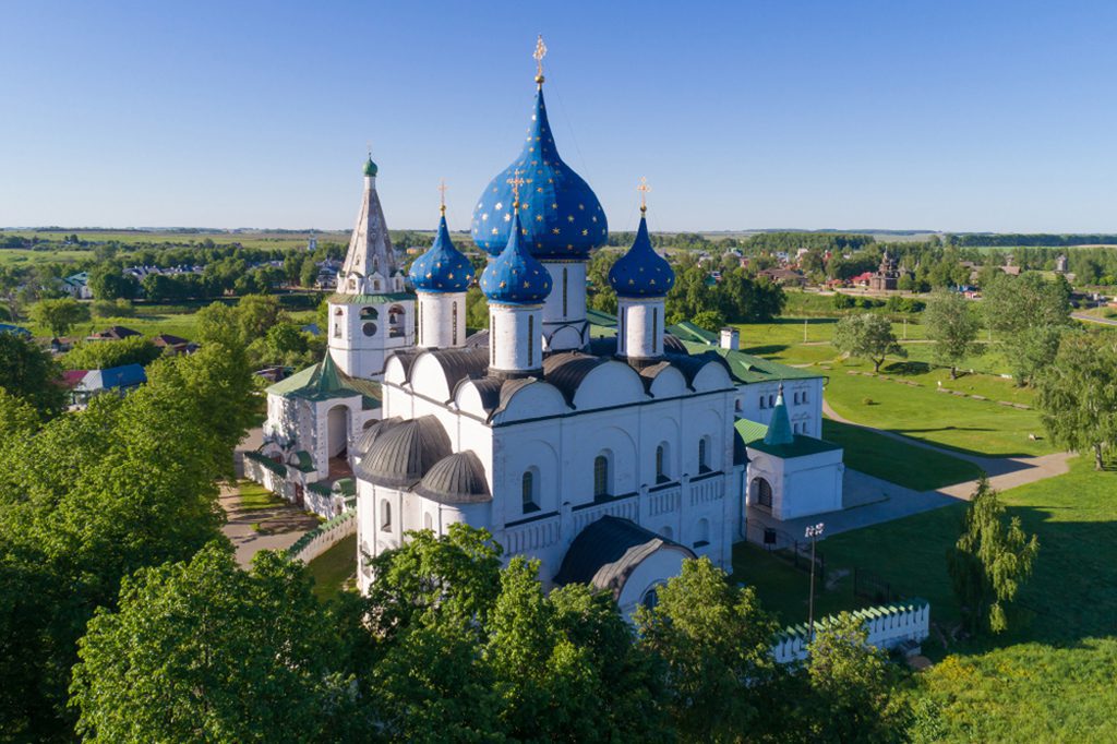 Aerial view of the Nativity Cathedral and bell tower in Suzdal Kremlin