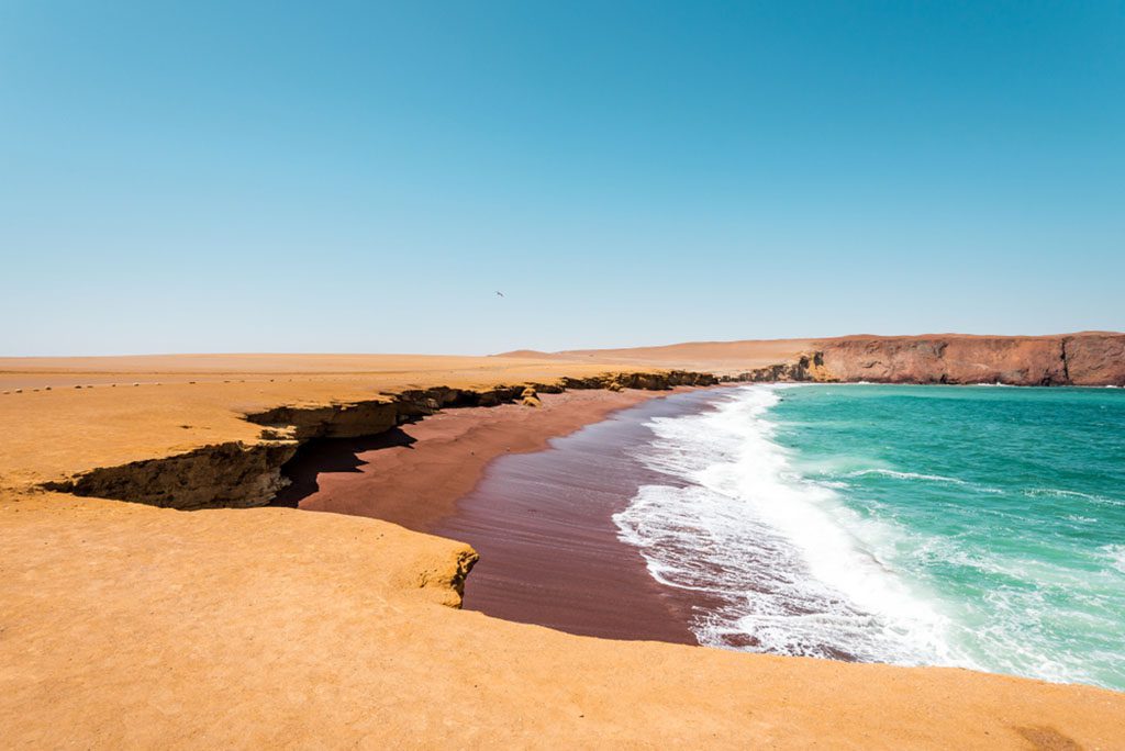 Playa Roja beach in Paracas National Reserve, Coastline of Peru by Tom Jastram