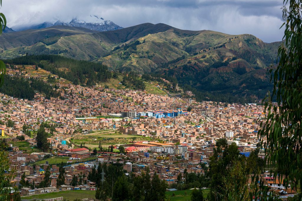 anoramic view of Huaraz city with the White Range in the background, Ancash, Peru."