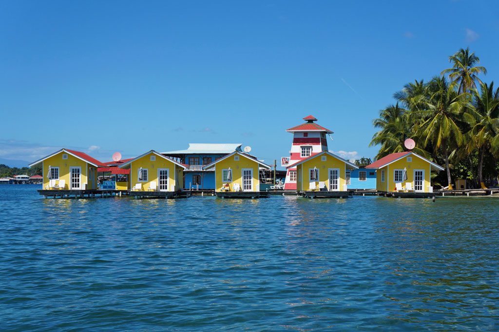Tropical vacation bungalows on Carenero Island, Bocas del Toro, Panama.
