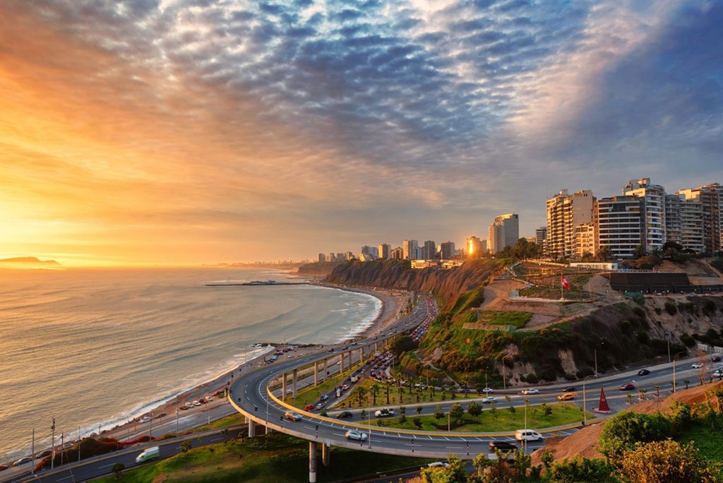 Golden hour sunset over Lima, Peru's Circuito de Playas de la Costa Verde."