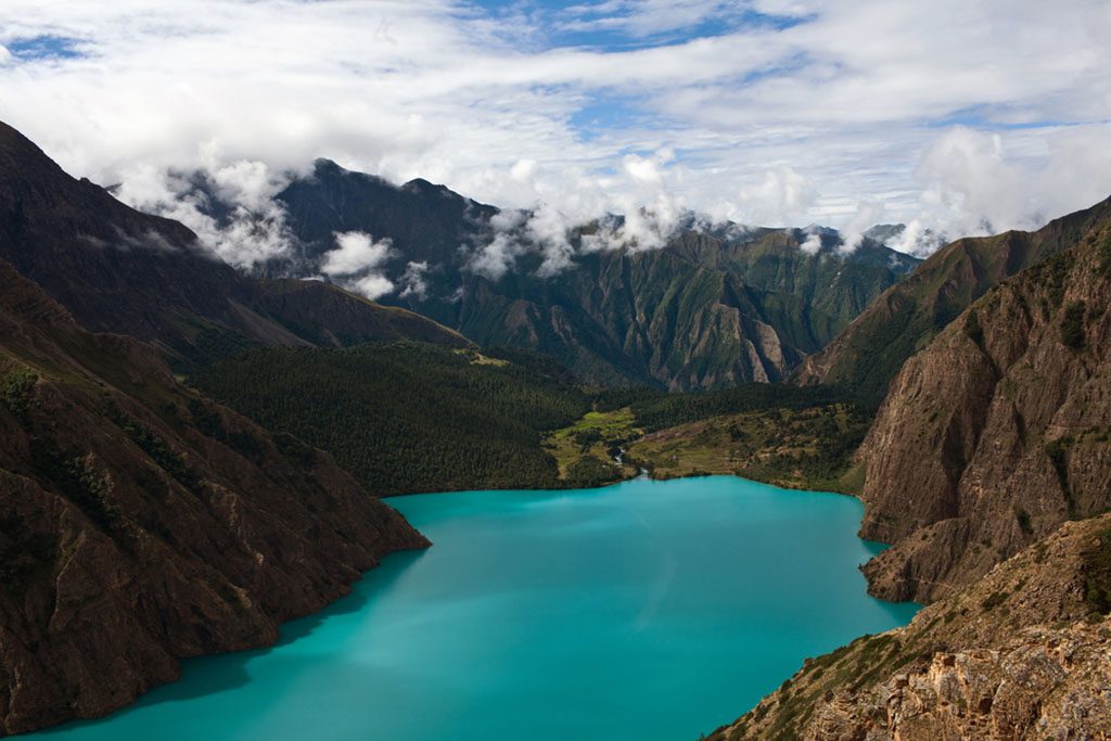 Panorama of mountain landscape with turquoise Phoksundo lake in Shey Phoksundo national park, Dolpo area, Nepal.