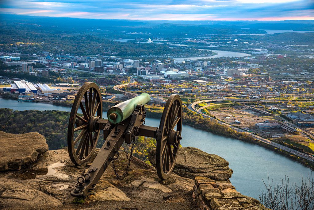 Aerial view of Chattanooga, Tennessee with the Tennessee River in the foreground.