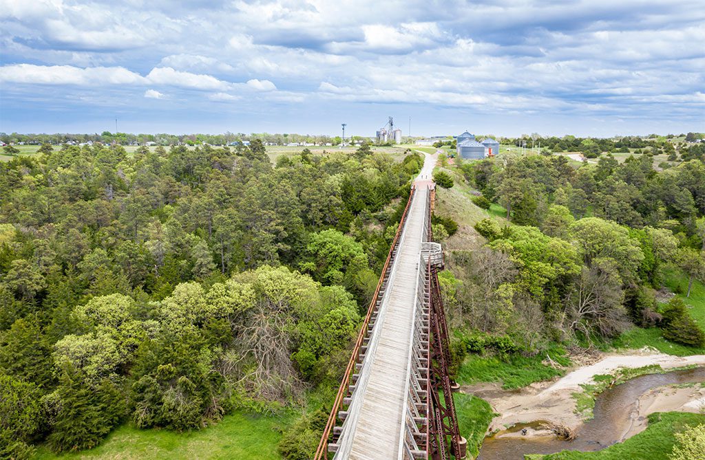 Aerial view of a long trestle over Long Pine Creek