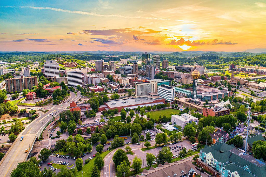 Knoxville, Tennessee city skyline at sunset.