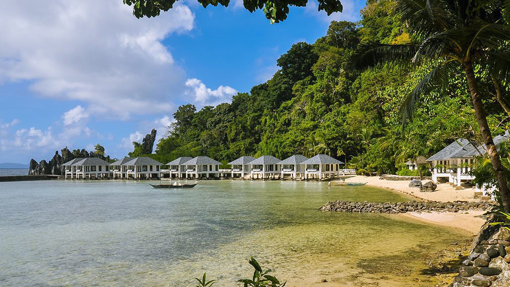 Beach cabanas at Lagen Island Resort, El Nido, Palawan, Philippines