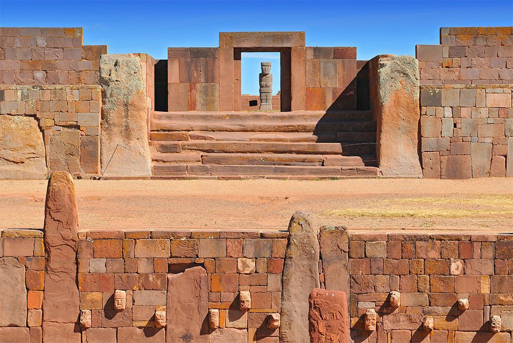 Ancient ruins of a temple in a barren landscape