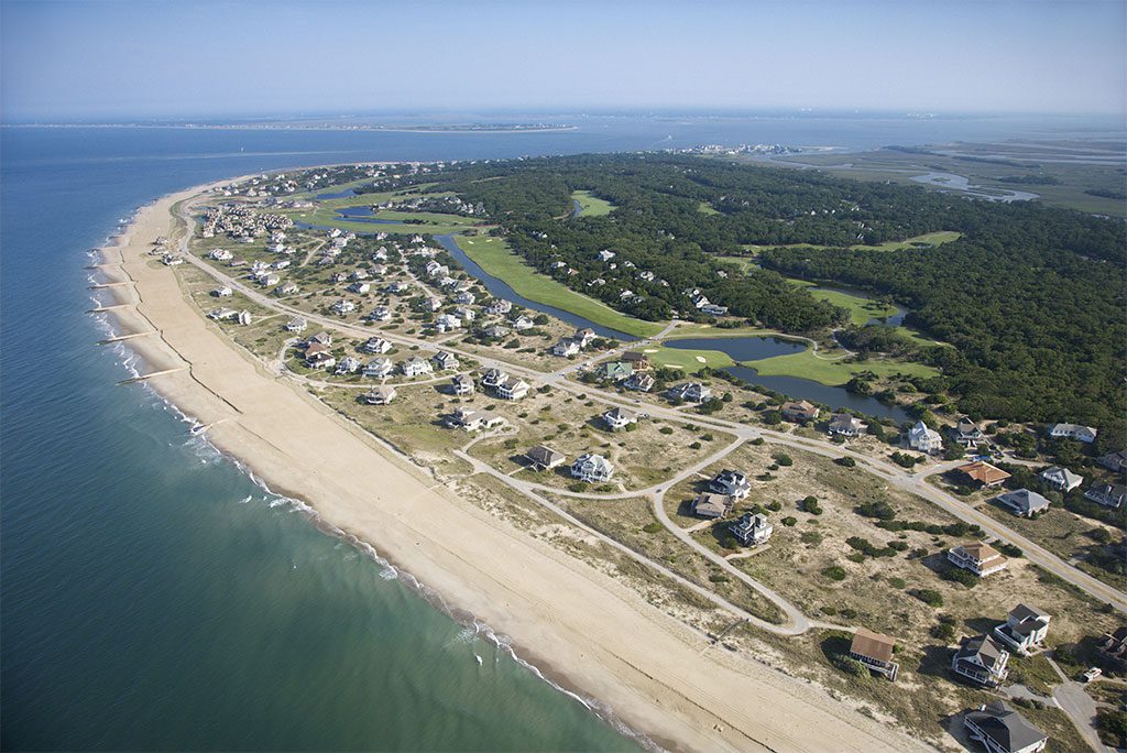 Aerial view of beach and neighborhood at Bald Head Island, North Carolina
