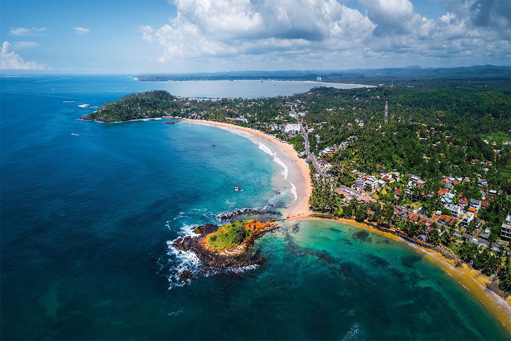 Aerial panorama of the tropical beach in Mirissa, Sri Lanka