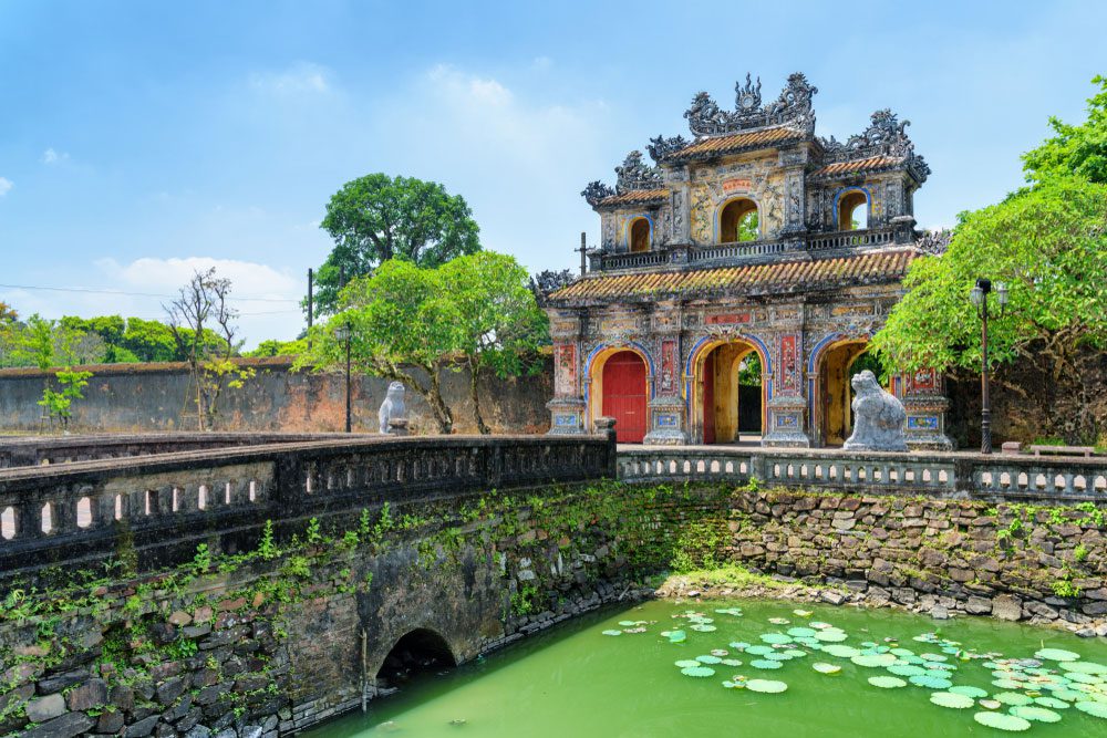 East Gate (Hien Nhon Gate) to the Citadel and moat surrounding Imperial City with the Purple Forbidden City in Hue, Vietnam.