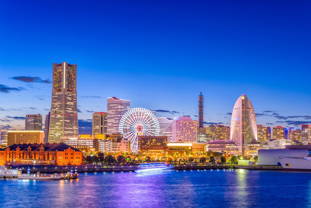 Yokohama, Japan city skyline from the bay at twilight