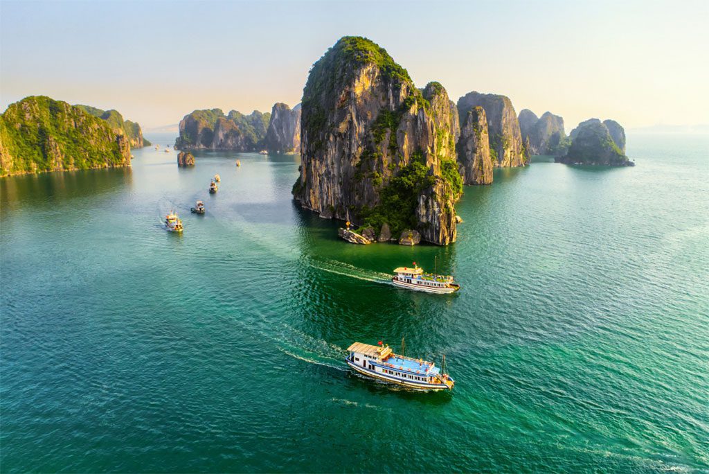 Aerial view of floating fishing village and rock island, Halong Bay, Vietnam