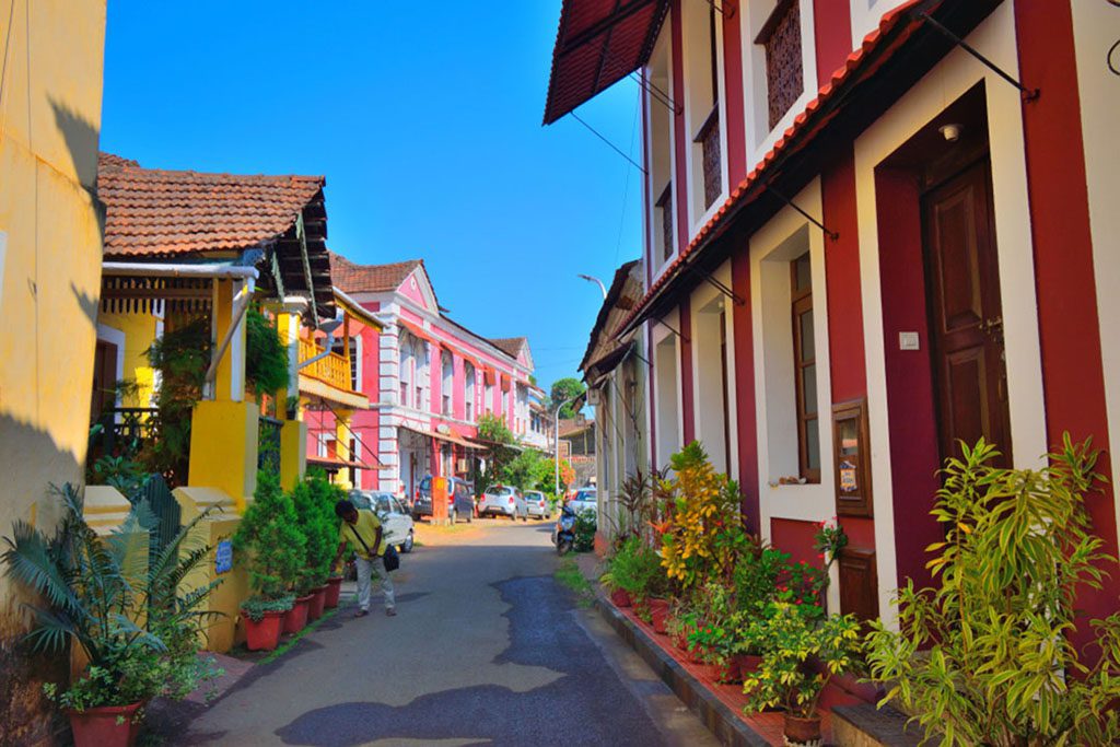 Colorful Portuguese houses lining a narrow lane in Panjim, Goa