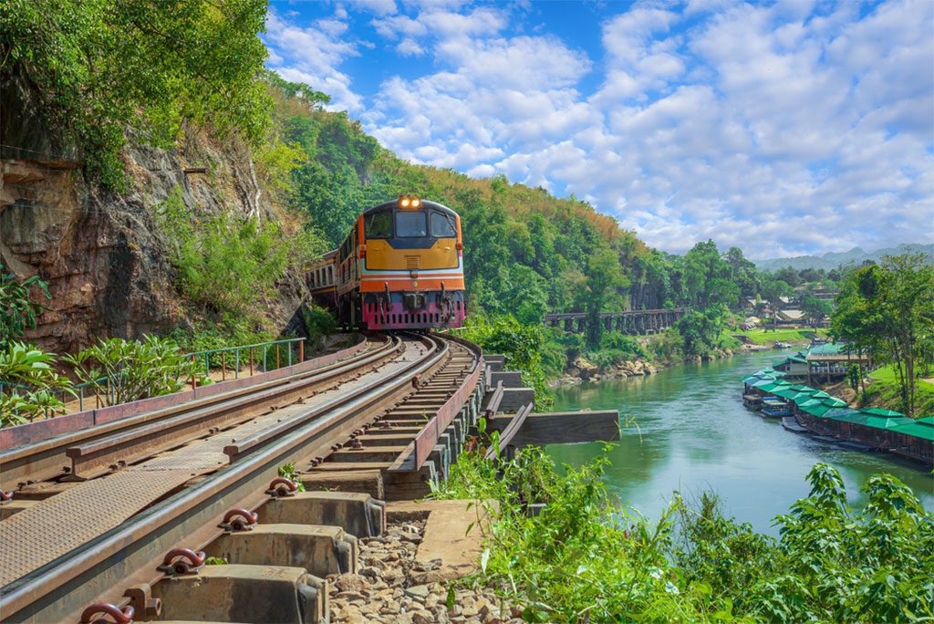 Train crossing Kwai River on Death Railway in Kanchanaburi, Thailand