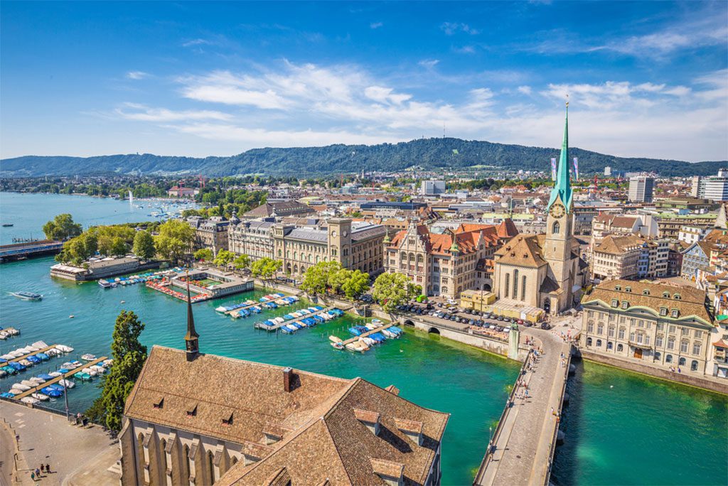 Aerial view of historic Zurich city center with Fraumunster Church and river Limmat at Lake Zurich