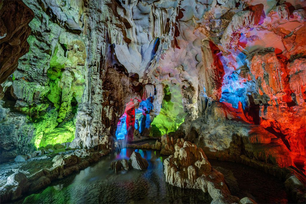 Colorful illumination in Dau Go cave in Halong Bay