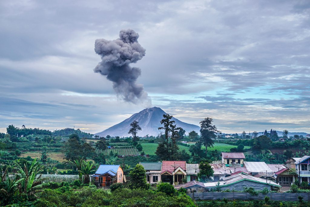 Sinabung Volcano Eruption at Sunrise