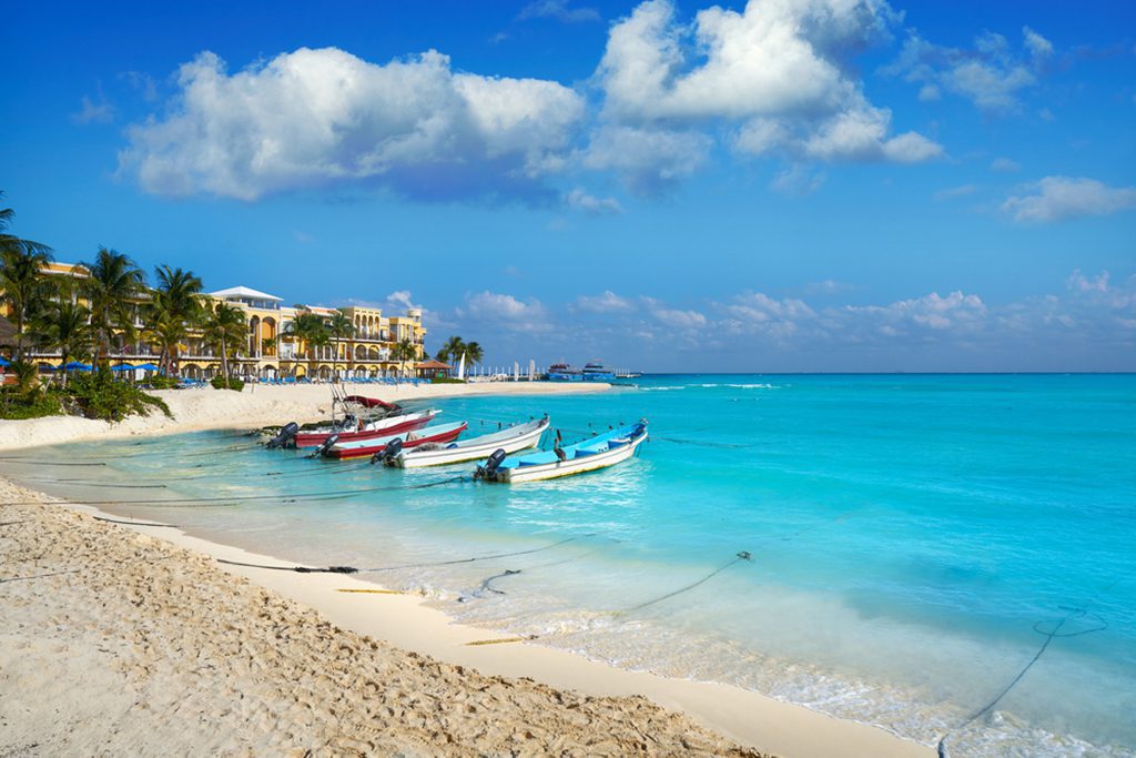 View of Playa del Carmen beach in Riviera Maya Caribbean with turquoise water and palm trees