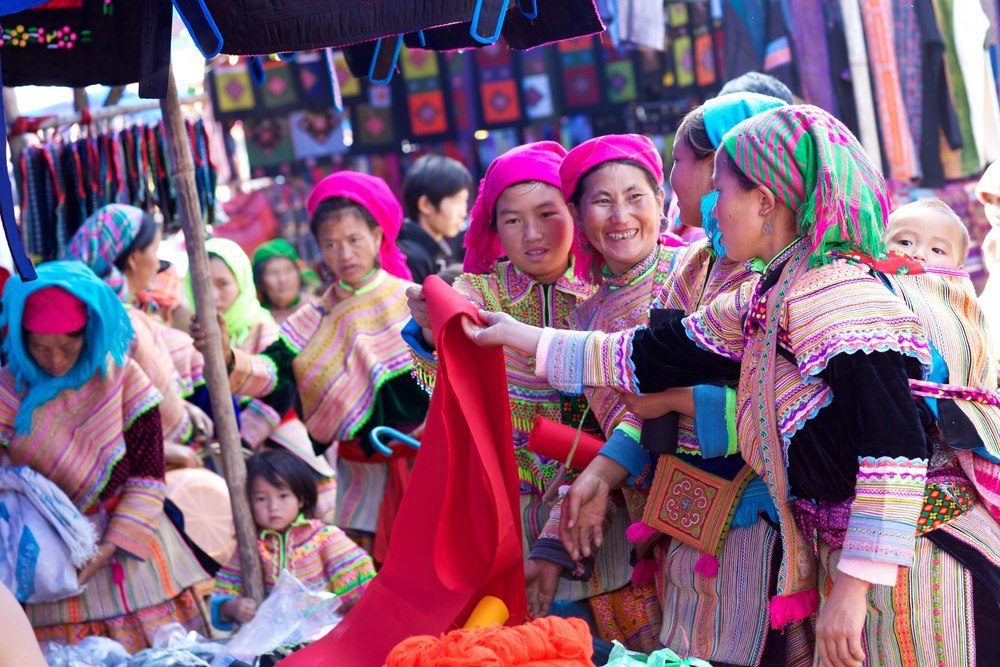 Unidentified girls of the Flower H'mong Ethnic Minority People at market in Bac Ha, Vietnam