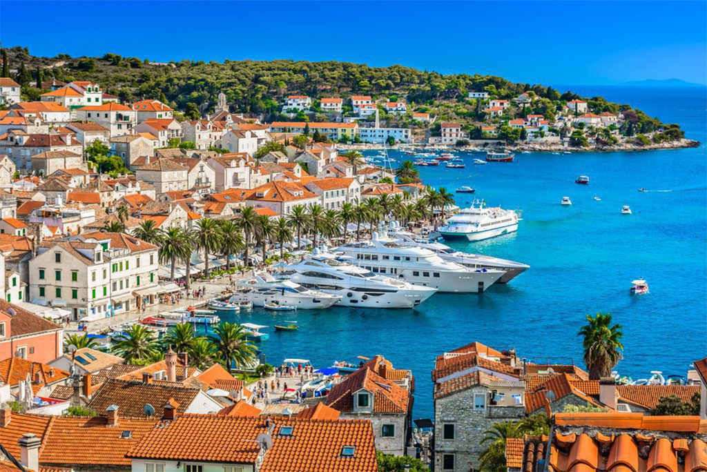 Aerial view of Hvar town in Southern Croatia, a popular luxury travel destination in Europe, Mediterranean.