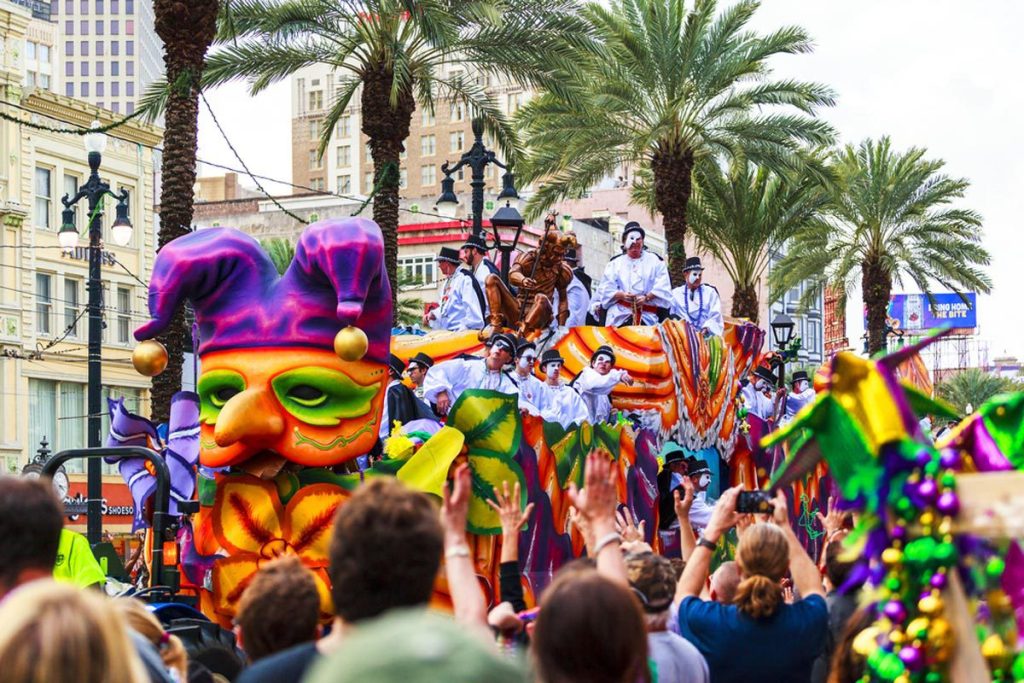 Colorful Mardi Gras parades making their way through the streets of New Orleans, USA