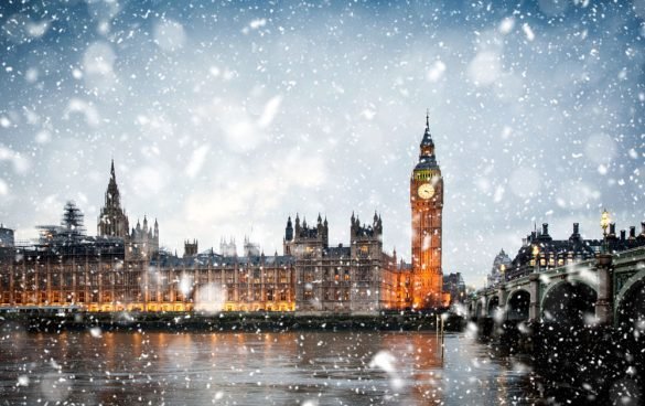 Snowing in London, UK - A perfect winter scene and one of the best places to spend Christmas in the UK.